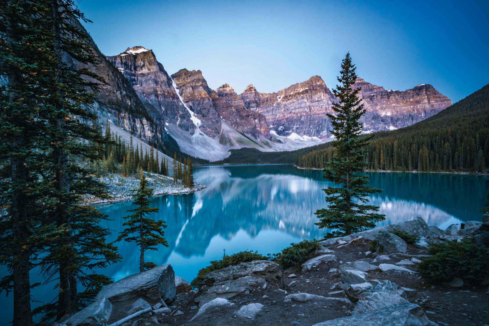 Moraine Lake in daylight, turquoise water beneath the Valley of the Ten Peaks